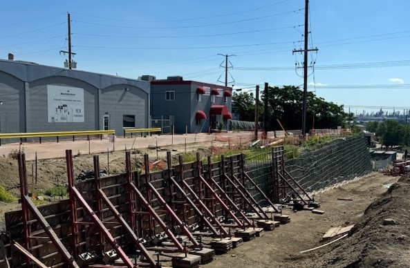 Recent views of wall construction underway wet of Franklin.